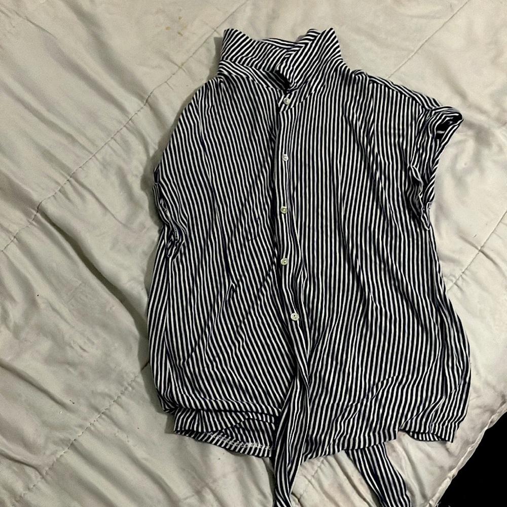Short sleeve button up blue and white stripped shirt. Size xxs. Dolan is brand.